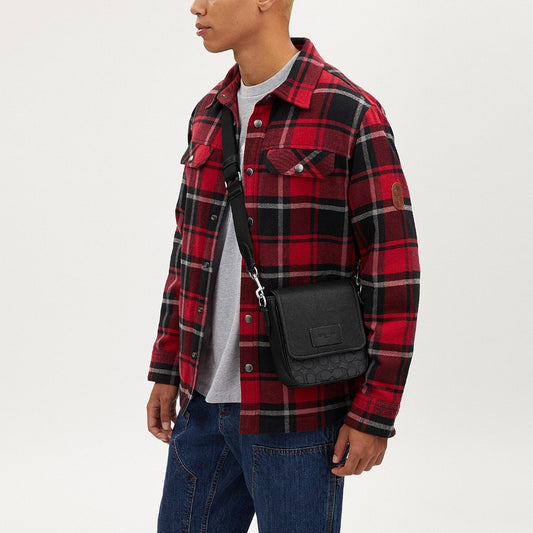 กระเป๋าสะพายข้างผู้ชาย รุ่น Lucas Crossbody In Signature Jacquard