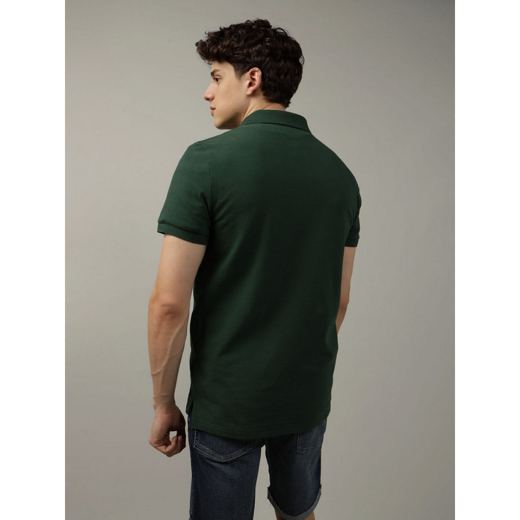 เสื้อโปโลผู้ชาย P-Slim Fit Solid Flex Polo W/ New Icon - Intl