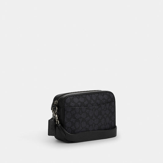 กระเป๋าสะพายข้างผู้ชาย รุ่น Warner Crossbody Bag In Signature Canvas