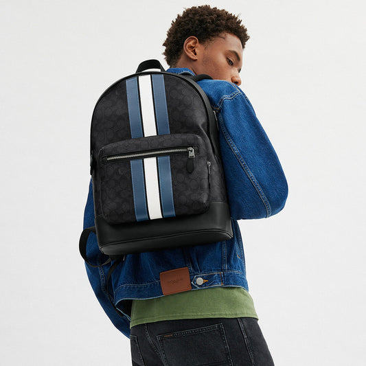 กระเป๋าเป้ผู้ชาย รุ่น West Backpack In Signature Canvas With Varsity Stripe
