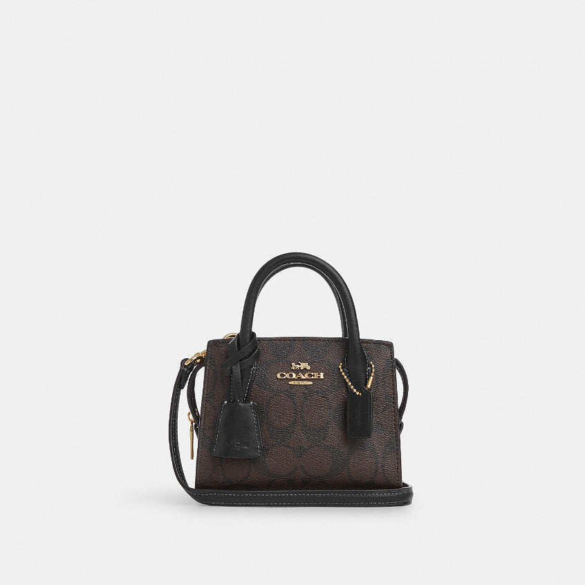 กระเป๋าสะพายข้างผู้หญิง รุ่น Andrea Mini Carryall In Signature Canvas