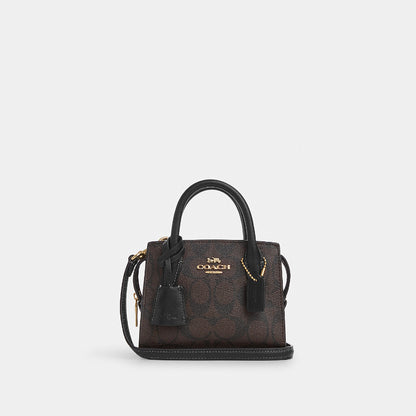 กระเป๋าสะพายข้างผู้หญิง รุ่น Andrea Mini Carryall In Signature Canvas