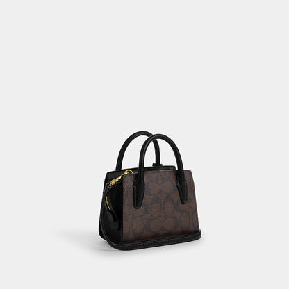 กระเป๋าสะพายข้างผู้หญิง รุ่น Andrea Mini Carryall In Signature Canvas