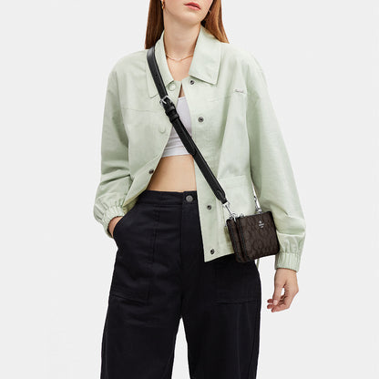 กระเป๋าสะพายข้างผู้หญิง รุ่น Double Zip Crossbody In Signature Canvas