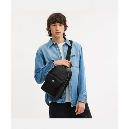 กระเป๋าคาดอกผู้ชาย รุ่น Turnlock Sling Pack In Signature Canvas