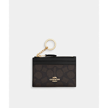 กระเป๋าใส่บัตรผู้หญิง รุ่น Mini Skinny Id Case In Signature Canvas