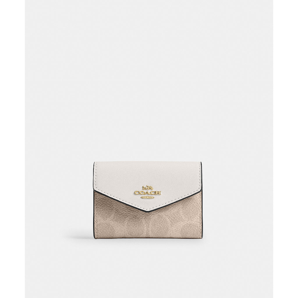กระเป๋าใส่บัตรผู้หญิง รุ่น Flap Card Case In Signature Canvas