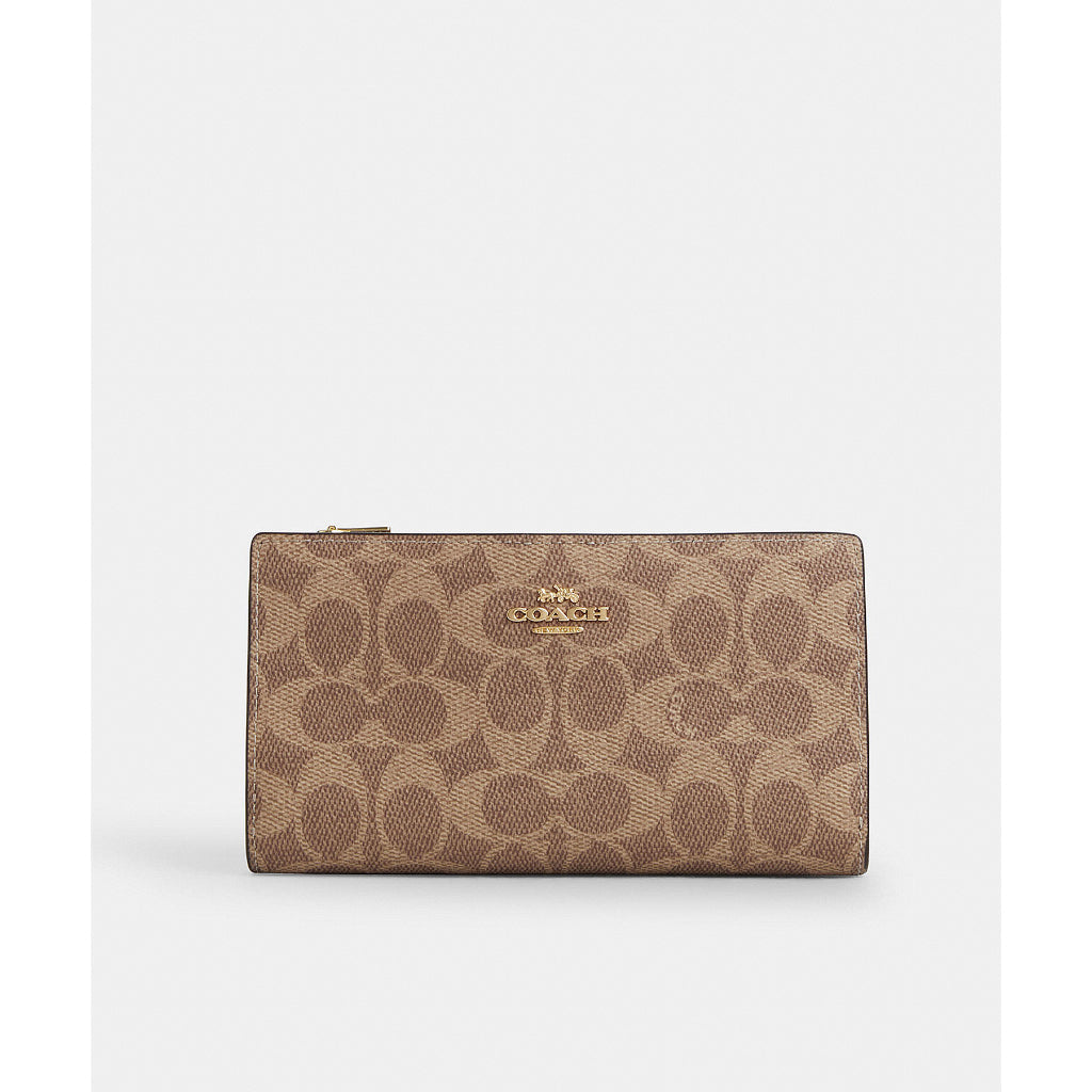 กระเป๋าสตางค์ผู้หญิง รุ่น Slim Zip Wallet In Signature Canvas