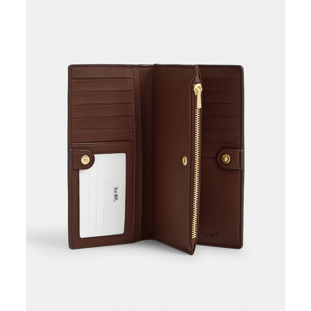 กระเป๋าสตางค์ผู้หญิง รุ่น Slim Zip Wallet In Signature Canvas