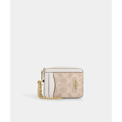 กระเป๋าใส่บัตรผู้หญิง รุ่น Zip Card Case In Signature Canvas