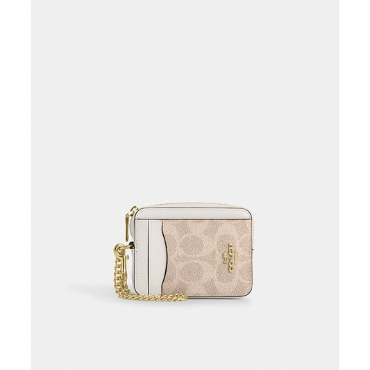 กระเป๋าใส่บัตรผู้หญิง รุ่น Zip Card Case In Signature Canvas