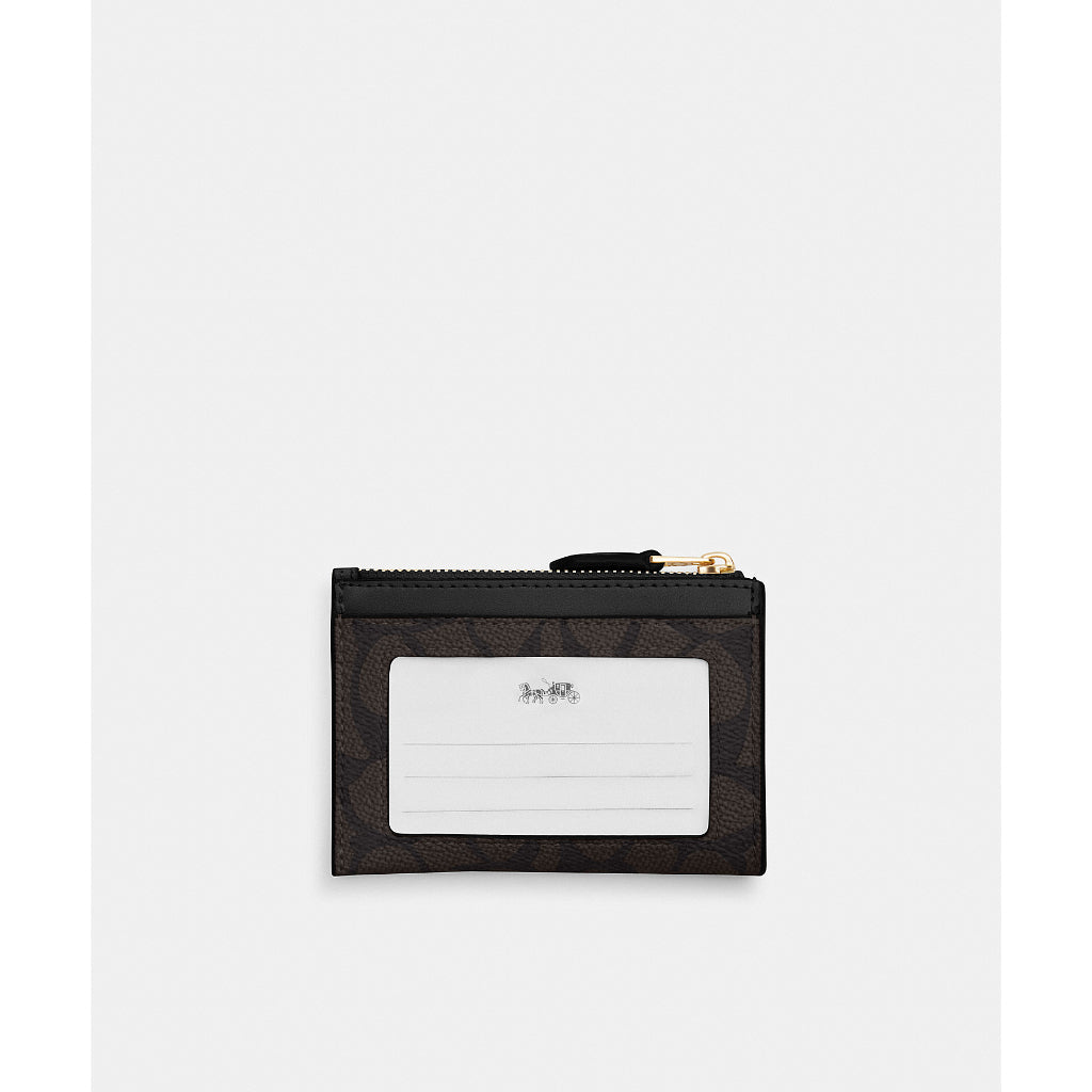 กระเป๋าใส่บัตรผู้หญิง รุ่น Mini Skinny Id Case In Signature Canvas