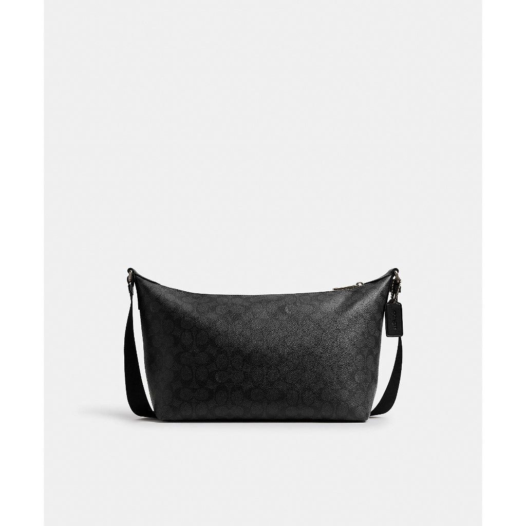 กระเป๋าสะพายข้างผู้ชาย รุ่น Finn Crossbody Bag In Signature Canvas