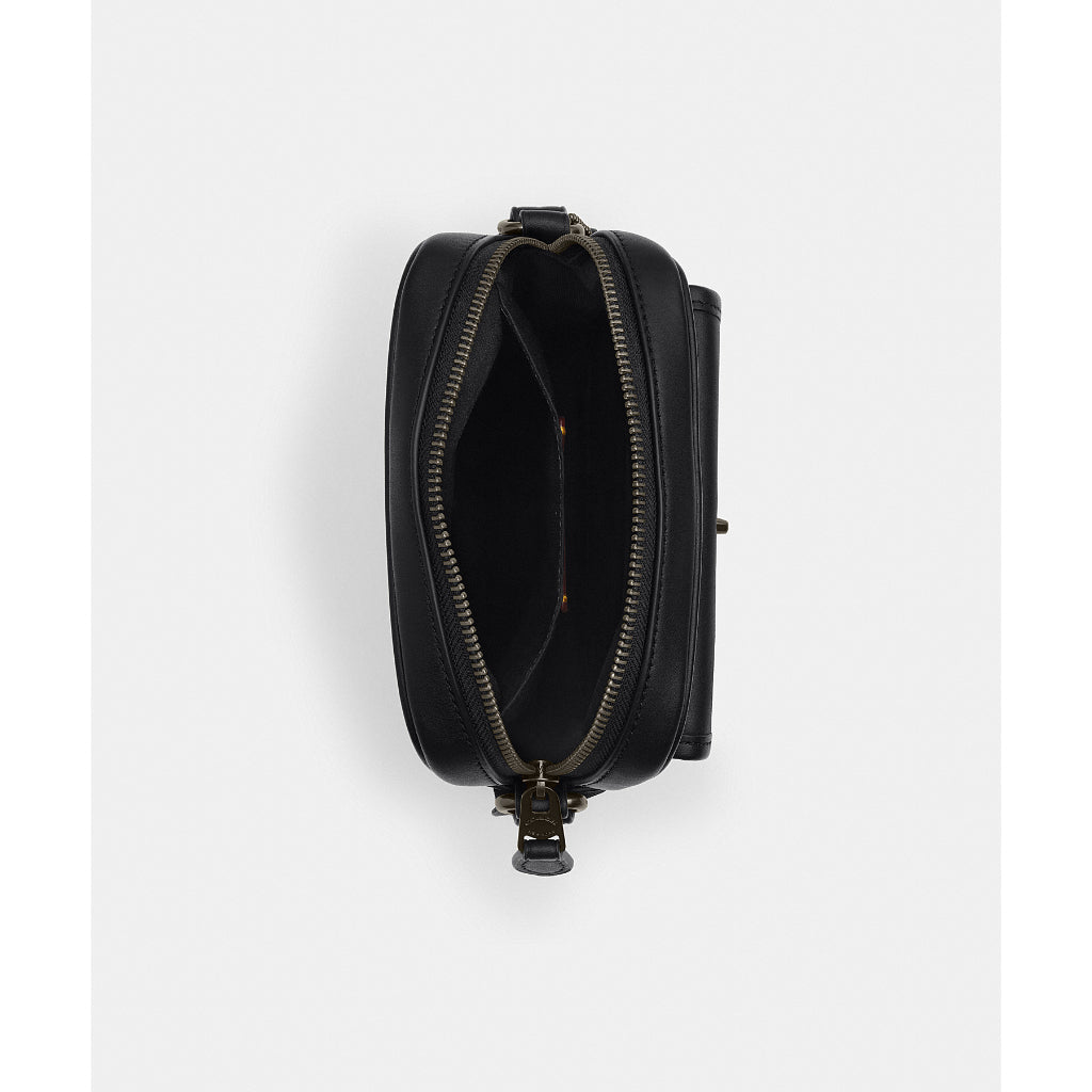 กระเป๋าสะพายข้างผู้ชาย รุ่น Turnlock Crossbody Bag In Signature Canvas