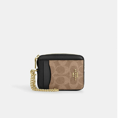 กระเป๋าใส่บัตรผู้หญิง รุ่น Zip Card Case In Signature Canvas