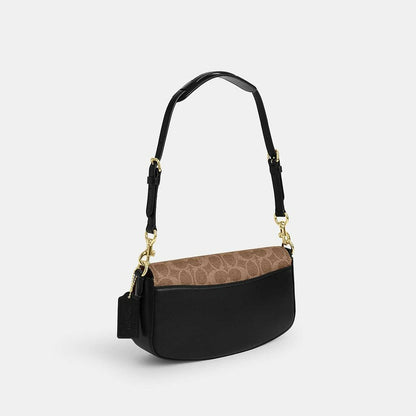 กระเป๋าสะพายผู้หญิง รุ่น Andrea Shoulder Bag In Signature Canvas