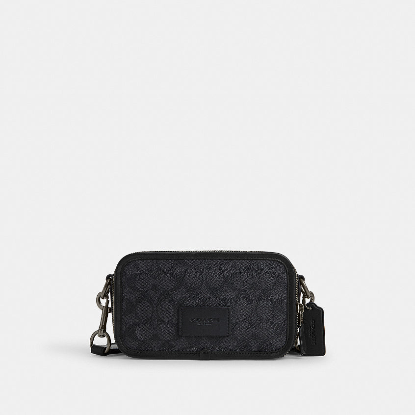 กระเป๋าสะพายข้างผู้ชาย รุ่น Wyatt Crossbody Bag In Signature Canvas