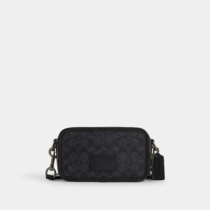กระเป๋าสะพายข้างผู้ชาย รุ่น Wyatt Crossbody Bag In Signature Canvas