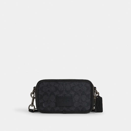 กระเป๋าสะพายข้างผู้ชาย รุ่น Wyatt Crossbody Bag In Signature Canvas