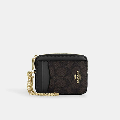 กระเป๋าใส่บัตรผู้หญิง รุ่น Zip Card Case In Signature Canvas