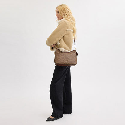 กระเป๋าสะพายผู้หญิง รุ่น Laurel Shoulder Bag In Signature Canvas