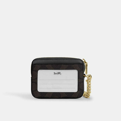 กระเป๋าใส่บัตรผู้หญิง รุ่น Zip Card Case In Signature Canvas