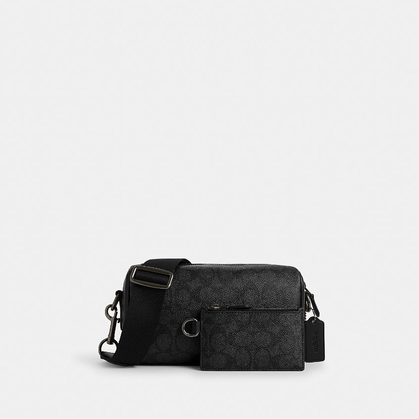 กระเป๋าสะพายข้างผู้ชาย รุ่น Axel Crossbody Bag In Signature Canvas