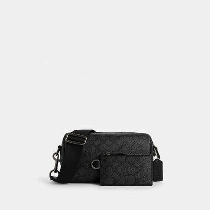 กระเป๋าสะพายข้างผู้ชาย รุ่น Axel Crossbody Bag In Signature Canvas