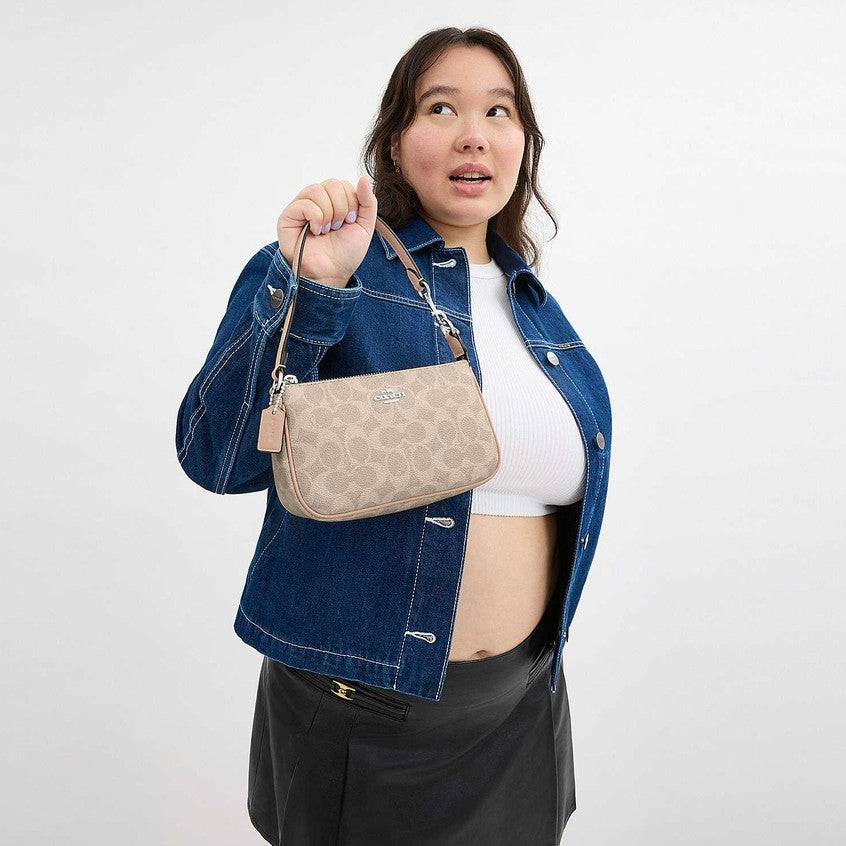 กระเป๋าคล้องมือผู้หญิง รุ่น Nolita 19 In Signature Canvas