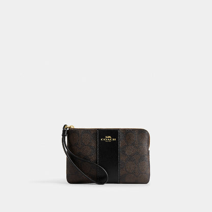 กระเป๋าคล้องมือผู้หญิง รุ่น Corner Zip Wristlet In Signature Canvas With Stripe