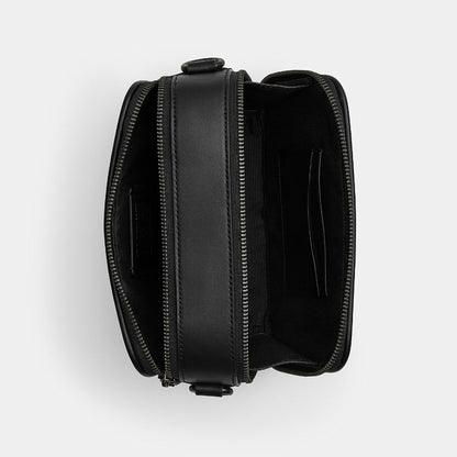 กระเป๋าสะพายข้างผู้ชาย รุ่น Wyatt Crossbody Bag In Signature Canvas