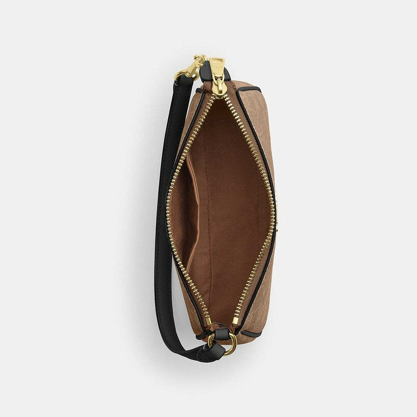 กระเป๋าคล้องมือผู้หญิง รุ่น Nolita 19 In Signature Canvas
