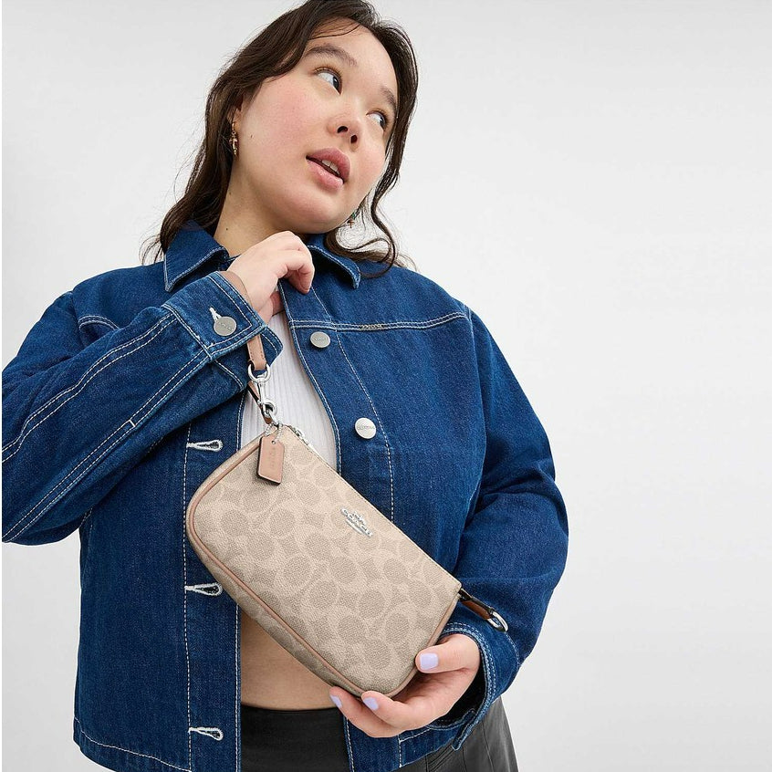 กระเป๋าคล้องมือผู้หญิง รุ่น Nolita 19 In Signature Canvas