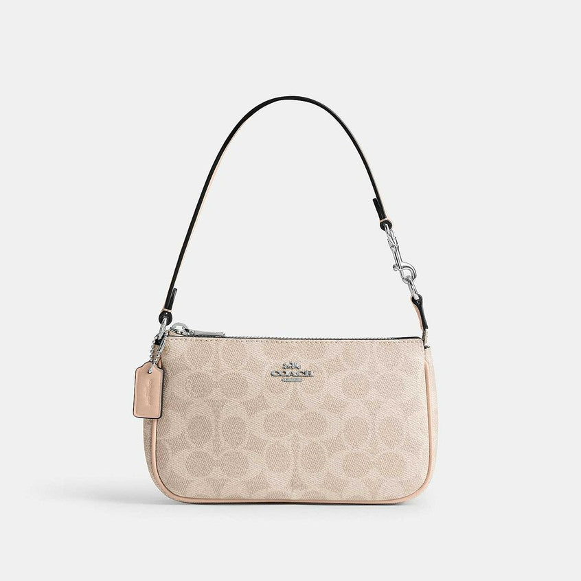 กระเป๋าคล้องมือผู้หญิง รุ่น Nolita 19 In Signature Canvas