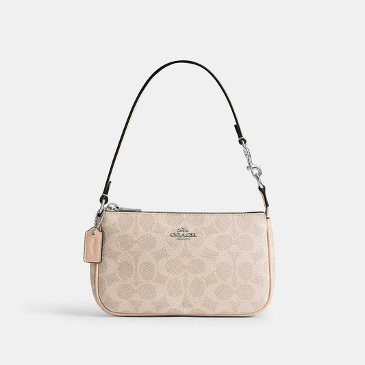 กระเป๋าคล้องมือผู้หญิง รุ่น Nolita 19 In Signature Canvas