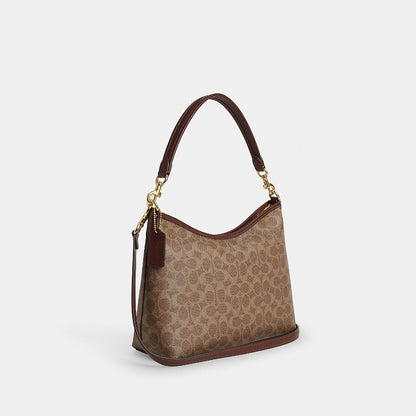 กระเป๋าสะพายผู้หญิง รุ่น Laurel Shoulder Bag In Signature Canvas