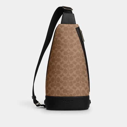 กระเป๋าคาดอกผู้ชาย รุ่น Dominic Sling Pack In Signature Canvas