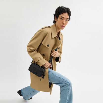 กระเป๋าสะพายข้างผู้ชาย รุ่น Wyatt Crossbody Bag In Signature Canvas