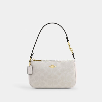 กระเป๋าคล้องมือผู้หญิง รุ่น Nolita 19 In Signature Canvas