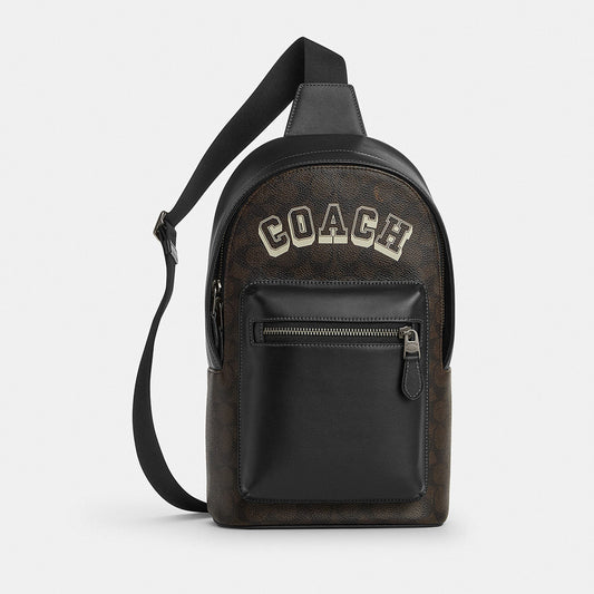กระเป๋าคาดอกผู้ชาย รุ่น West Pack In Signature Canvas With Varsity Graphic