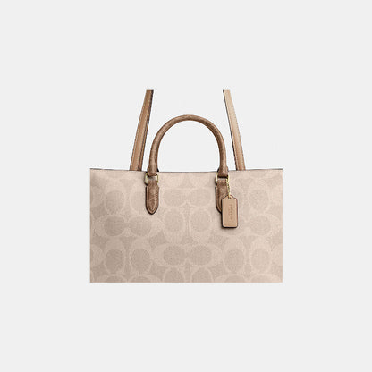 กระเป๋าสะพายผู้หญิง รุ่น Maggie Tote Bag In Blocked Signature Canvas