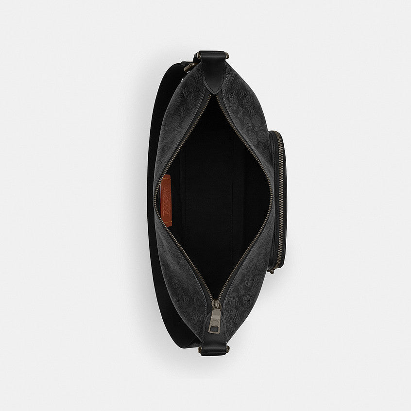 กระเป๋าสะพายข้างผู้ชาย รุ่น Finn Crossbody Bag With Pockets In Signature Canvas