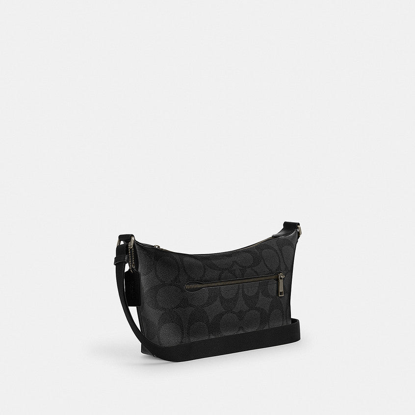 กระเป๋าสะพายข้างผู้ชาย รุ่น Small Finn Crossbody Bag With Pouch In Maxi Signature Canvas