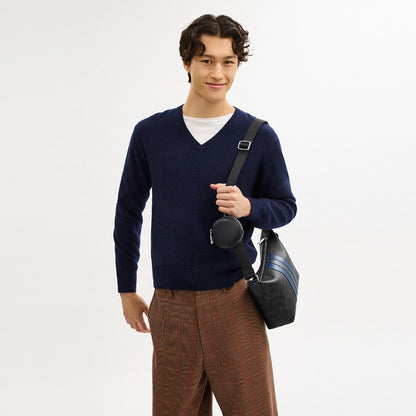 กระเป๋าสะพายข้างผู้ชาย รุ่น Small Finn Crossbody with Pouch in Signature Canvas with Varsity Stripe