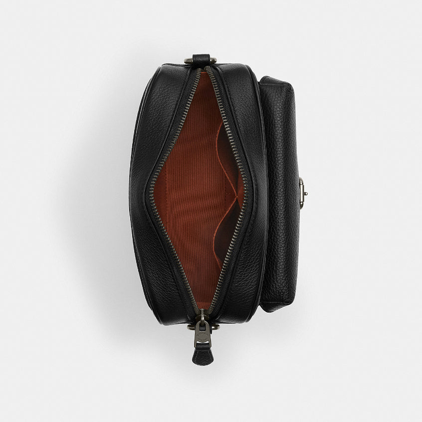 กระเป๋าสะพายข้างผู้ชาย รุ่น Warner Crossbody Bag In Signature Canvas