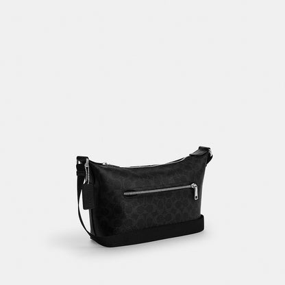 กระเป๋าสะพายข้างผู้ชาย รุ่น Small Finn Crossbody with Pouch in Signature Canvas with Varsity Stripe