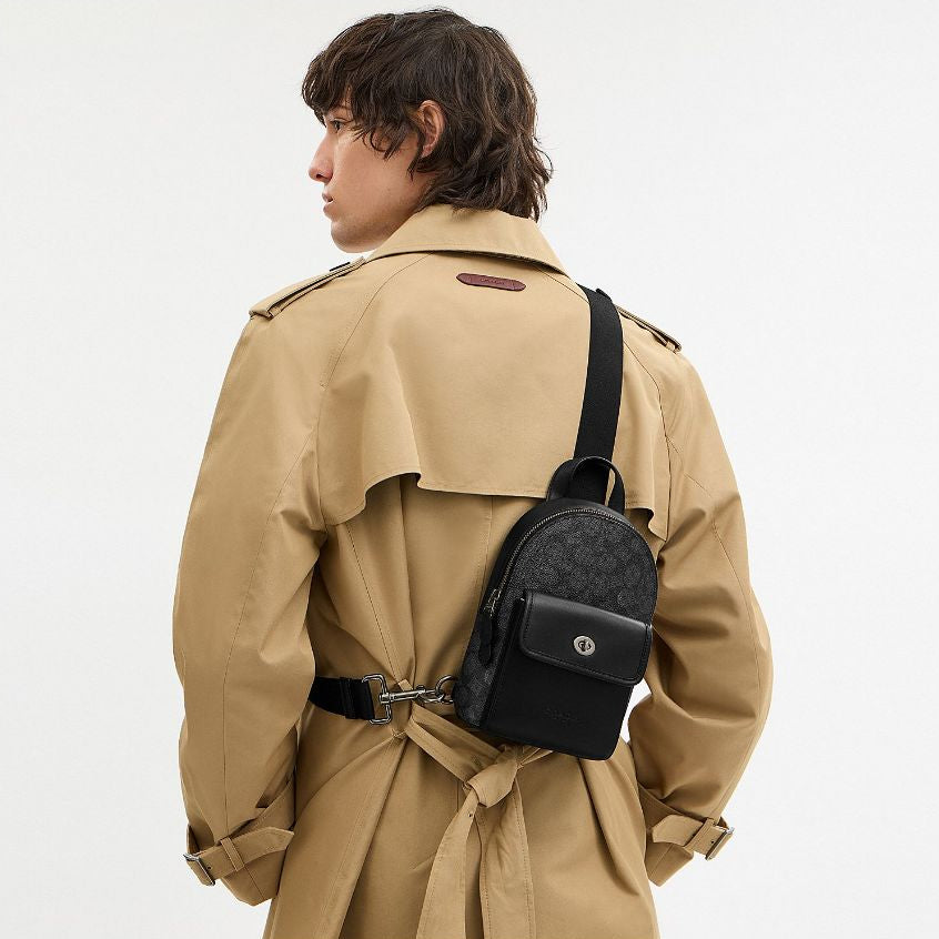 กระเป๋าคาดอกผู้ชาย รุ่น Small Turnlock Sling Pack In Signature Canvas