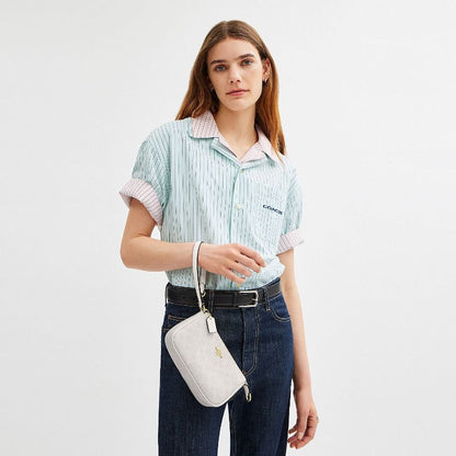 กระเป๋าคล้องมือผู้หญิง รุ่น Nolita 19 In Signature Canvas