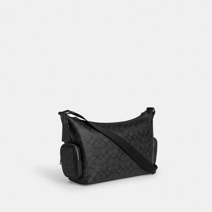 กระเป๋าสะพายข้างผู้ชาย รุ่น Finn Crossbody Bag With Pockets In Signature Canvas
