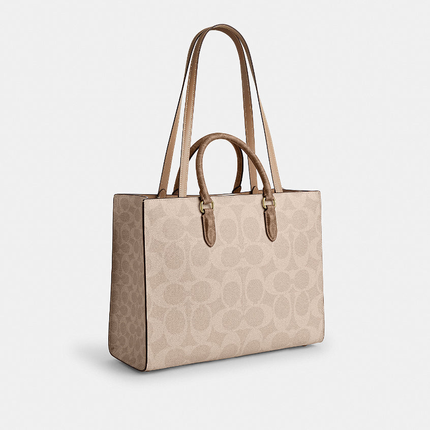 กระเป๋าสะพายผู้หญิง รุ่น Maggie Tote Bag In Blocked Signature Canvas